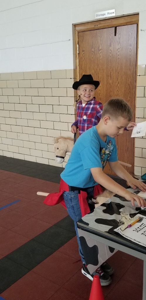 Isabella and Wyatt compete against each other to figure out the sum of a problem and race to the other end to sort the answer into even or odd buckets!